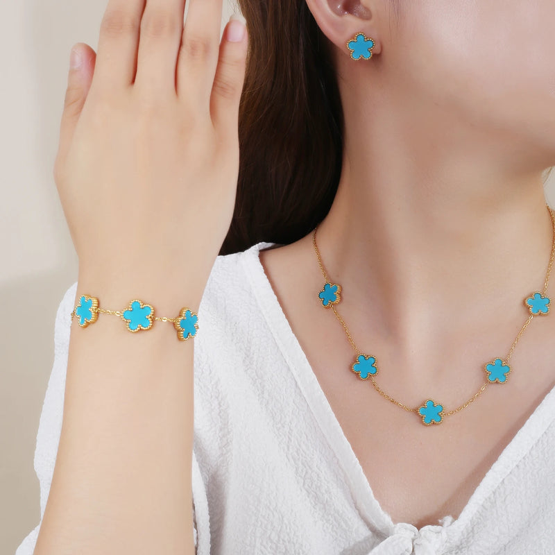 Conjunto de Joias Feminino Aço Inox – Flor de Trevo com 5 Pétalas (Bracelete, Colar e Brinco)