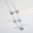 Conjunto de Joias Feminino Aço Inox – Flor de Trevo com 5 Pétalas (Bracelete, Colar e Brinco)