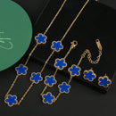 Conjunto de Joias Feminino Aço Inox – Flor de Trevo com 5 Pétalas (Bracelete, Colar e Brinco)