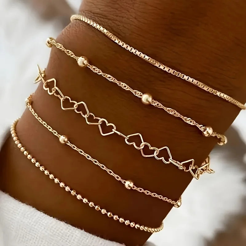 Conjunto de 5 Pulseiras Douradas Femininas – Delicadas, Empilháveis e Modernas